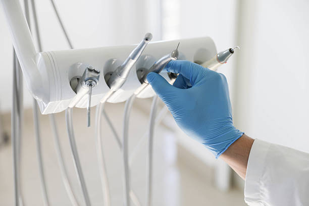 Professional Invisalign Clear Aligners technician working in Hillsboro, TX
